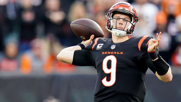 Cincinnati Bengals quarterback Joe Burrow (9) runs out of the pocket in the fourth quarter during a Week 16 NFL game against the Baltimore Ravens, Sunday, Dec. 26, 2021, at Paul Brown Stadium in Cincinnati. The Cincinnati Bengals defeated the Baltimore Ravens, 41-21.

Baltimore Ravens At Cincinnati Bengals Dec 26
